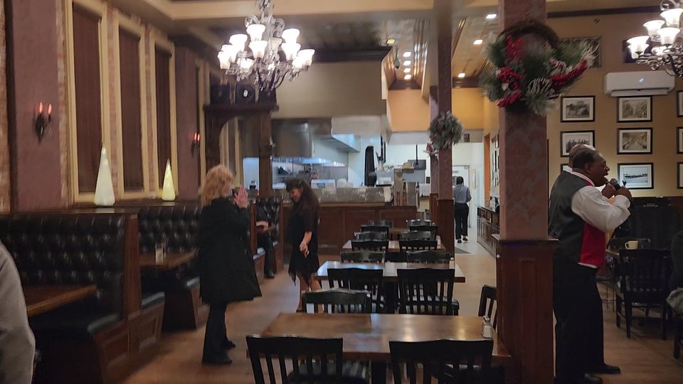Classic interior with bar seating and wood details.
